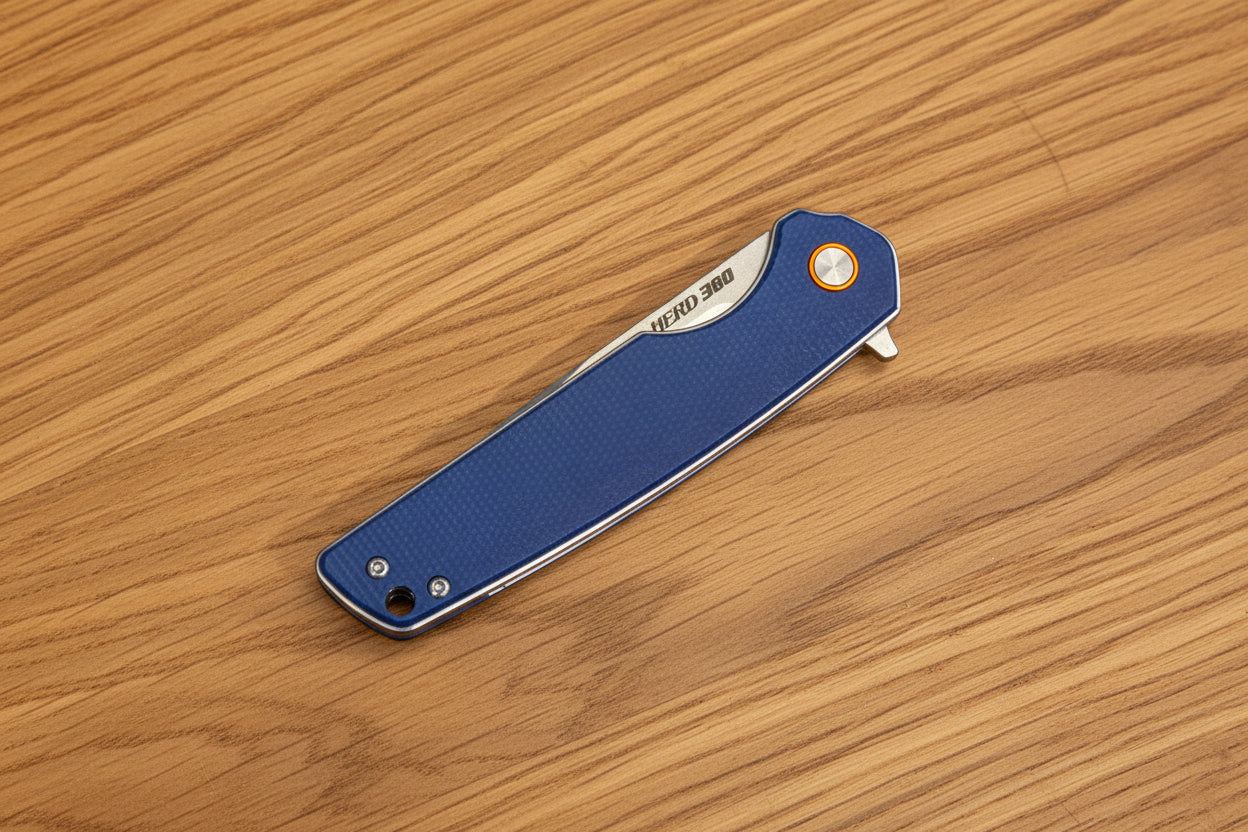 Blue handle liner lock folding knife