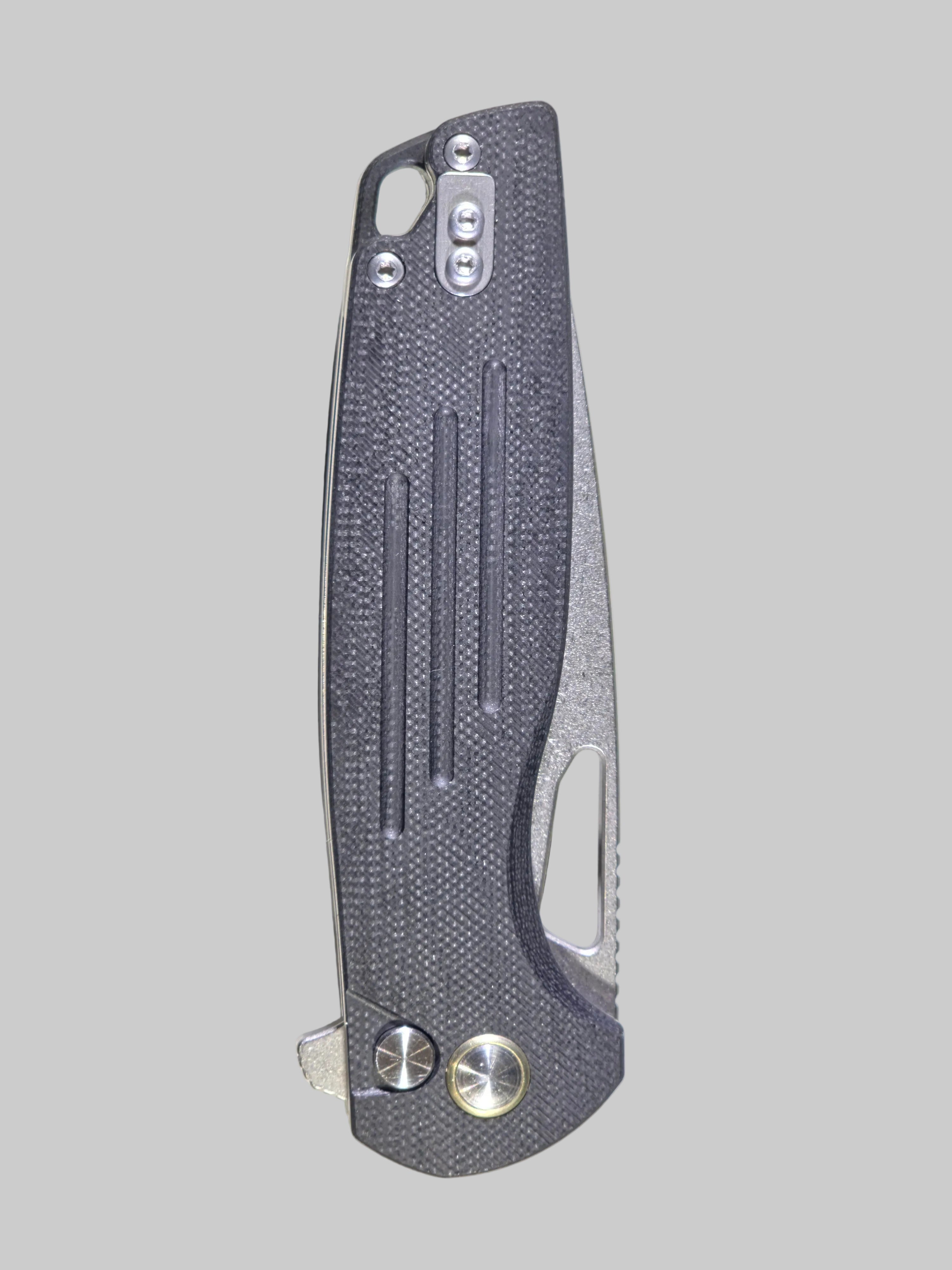 Folding knife with a textured handle on a white background