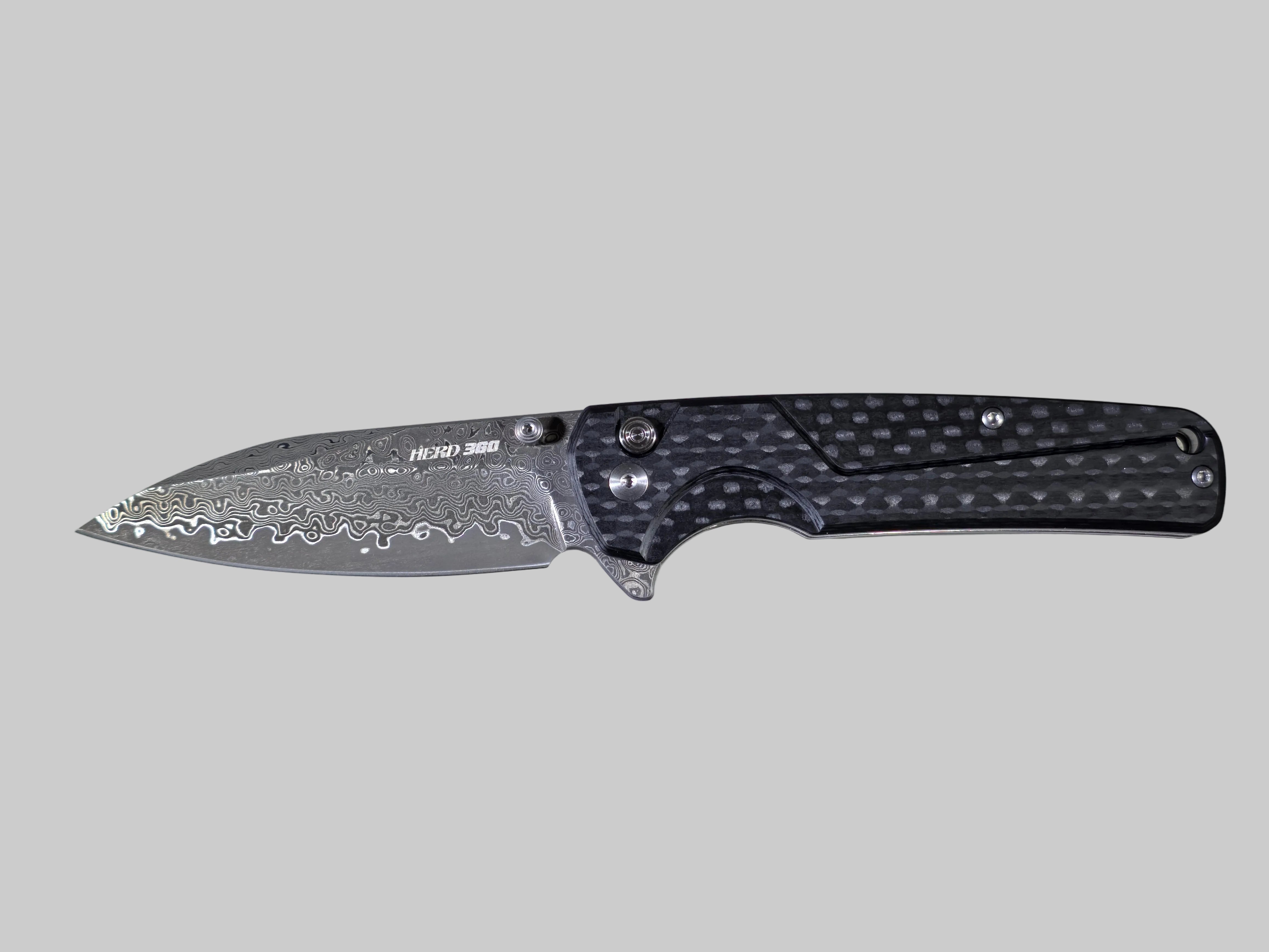 Folding knife with a textured handle on a light gray background