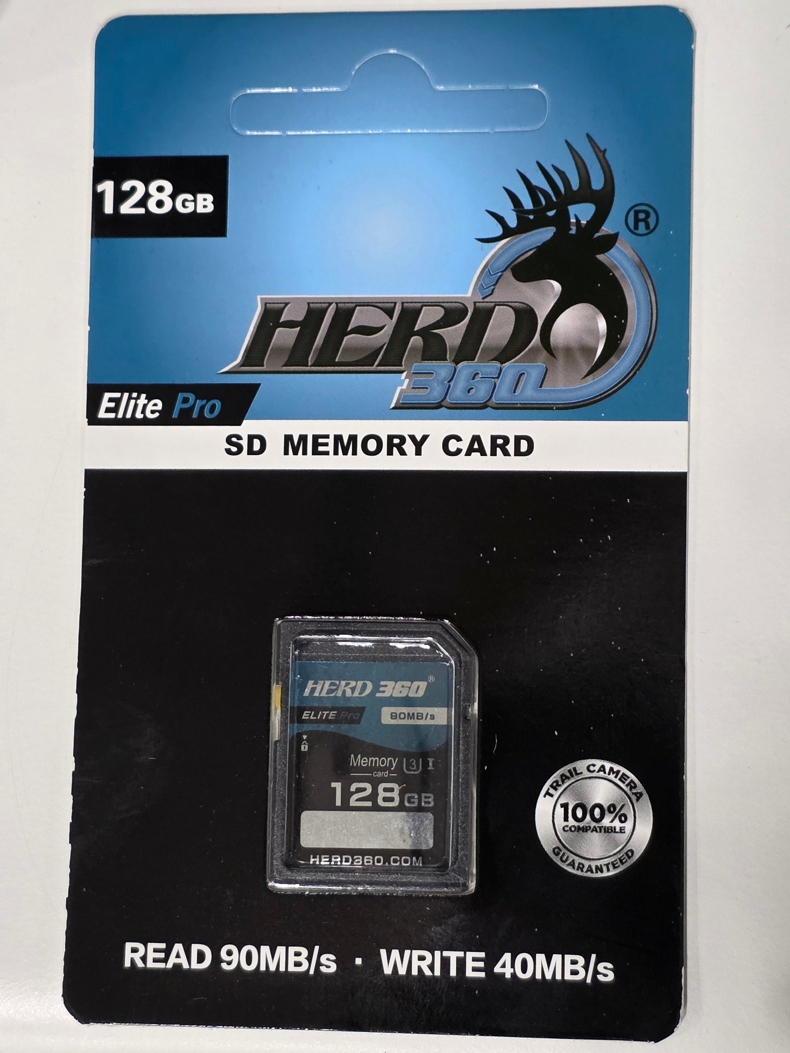 A 128GB Herd 360 Elite Pro SD Memory Card in its original retail blister packaging, resting on a white surface.